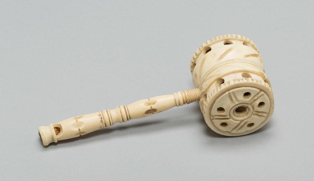 A court form on a desk beside a gavel